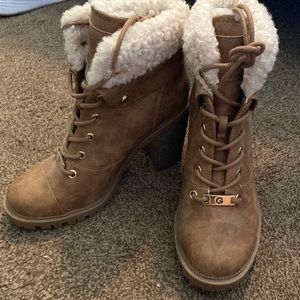 Tan 3 inch heeled boots. Worn once. Great condition. Size 7